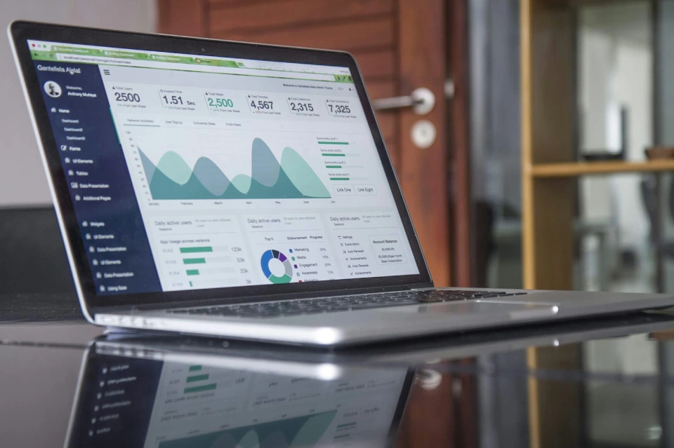 Laptop displaying detailed analytics and performance metrics.