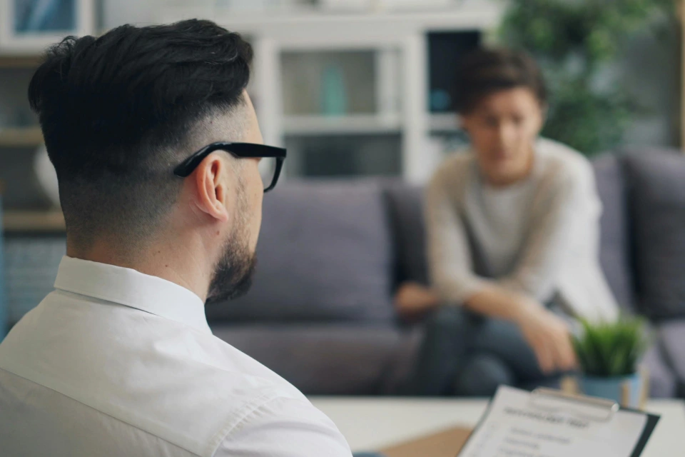 Consultant listening to a client’s concerns attentively